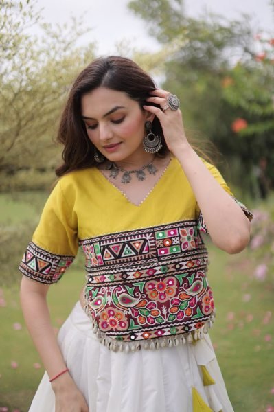 Ethereal White Yellow Roman Fabric Garba Lehenga Choli with Mirror Lace Design Navratri Lehnega Choli