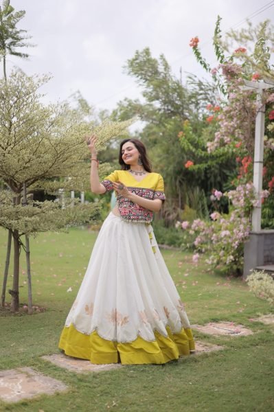 Ethereal White Yellow Roman Fabric Garba Lehenga Choli with Mirror Lace Design Navratri Lehnega Choli