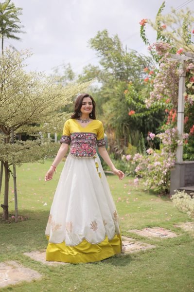 Ethereal White Yellow Roman Fabric Garba Lehenga Choli with Mirror Lace Design Navratri Lehnega Choli