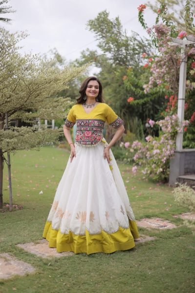 Ethereal White Yellow Roman Fabric Garba Lehenga Choli with Mirror Lace Design Navratri Lehnega Choli