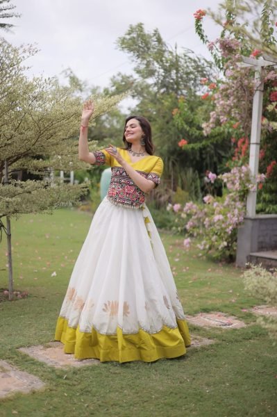 Ethereal White Yellow Roman Fabric Garba Lehenga Choli with Mirror Lace Design Navratri Lehnega Choli