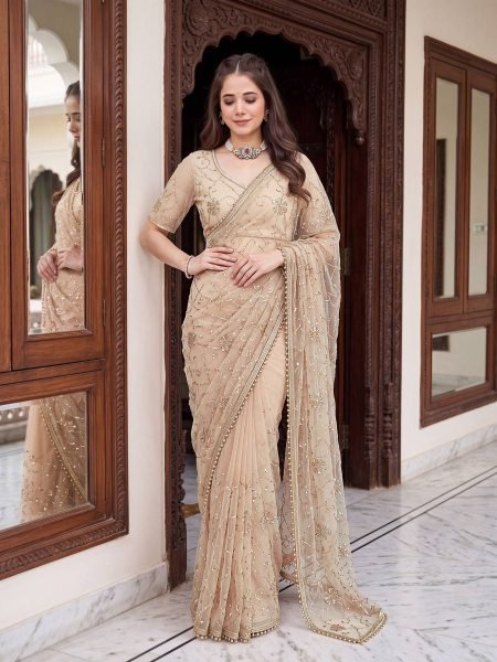 Exceptional Cream Designer Net Saree with Rich Pearl  Beads Work and Matching Net Blouse Fabric 