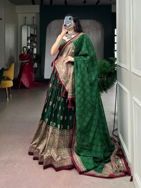 Exquisite Dark Green Tasar Silk Navratri Lehenga Choli with Ajrak Print Work For Functions Navratri Lehnega Choli