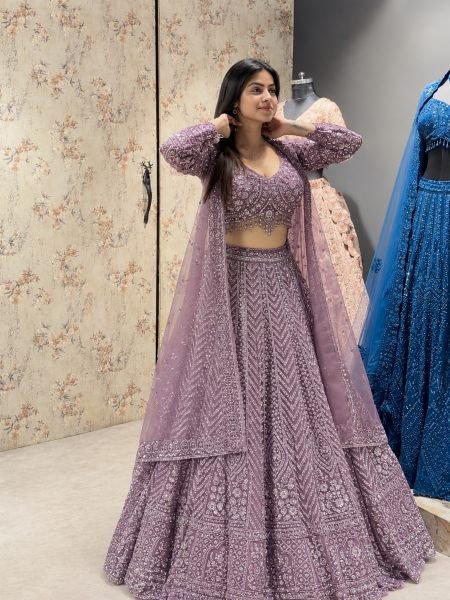 Exquisite Purple Net Lehenga Choli with Front and Back Sequin Embroidered Blouse  Lehenga