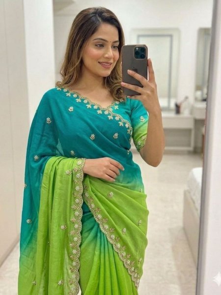 Extraordinary Sea Blue and Parrot Green Shaded Saree with Moti Details  