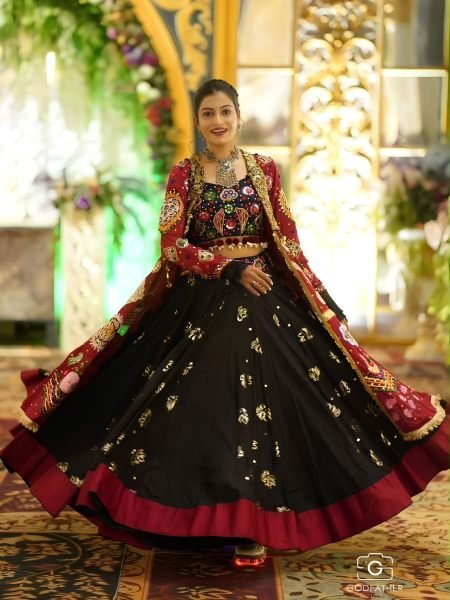 Fascinating Black Garba Wear Lehenga Choli Set with Mirror Work and Designer Shrug  Lehenga