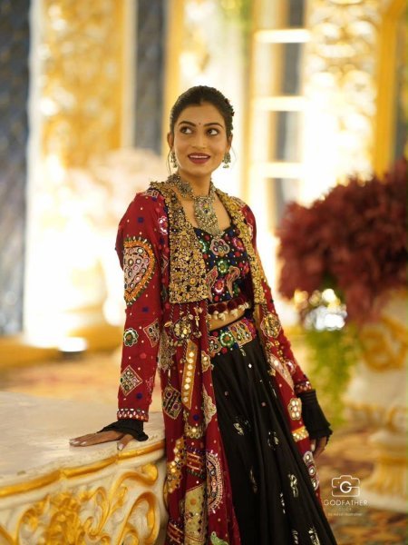 Fascinating Black Garba Wear Lehenga Choli Set with Mirror Work and Designer Shrug Navratri Lehnega Choli