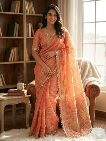 Fashionable Orange Tissue Silk Saree with Designer Lace Border for Wedding Wear 