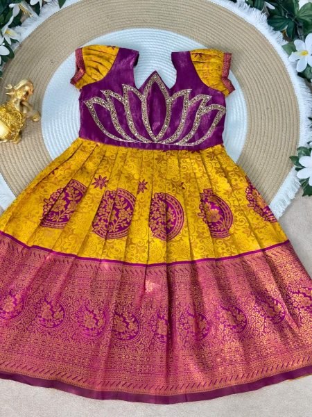 Festive Wear Yellow Girls Silk Pattu Pavadai with Contrast Lotus Motif Blouse Girls Wear
