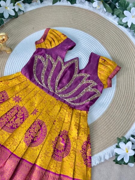 Festive Wear Yellow Girls Silk Pattu Pavadai with Contrast Lotus Motif Blouse Girls Wear