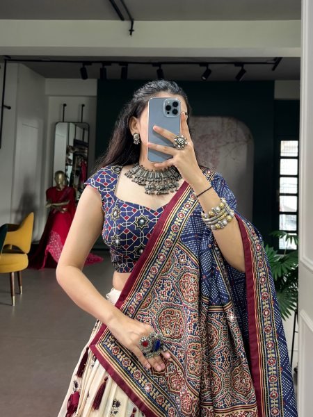 Glamorous Cream Tasar Silk Ajrak Print Lehenga with Mirror Work and Dupatta for Festival Navratri Lehnega Choli