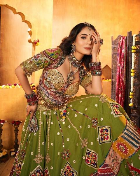 Gorgeous Green Color Navratri Outfit With Real Mirror And Kodi Work For Garba Nights Navratri Lehnega Choli