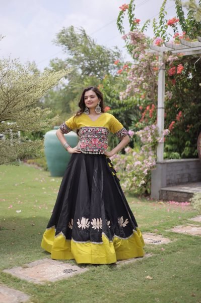 Graceful Black Yellow Roman Fabric Navratri Lehenga Choli with Kutchi Gamthi Work Navratri Lehnega Choli