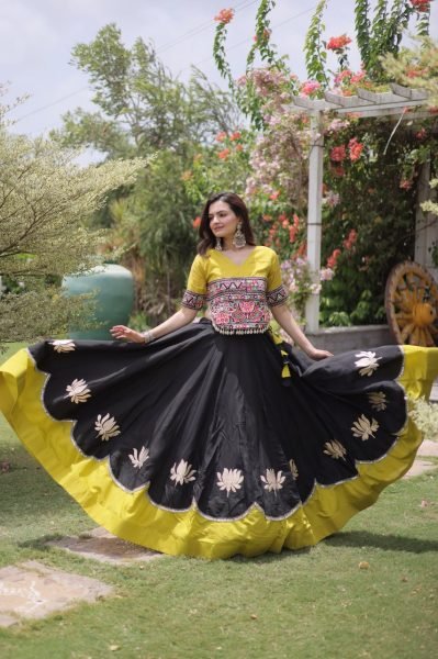 Graceful Black Yellow Roman Fabric Navratri Lehenga Choli with Kutchi Gamthi Work Navratri Lehnega Choli
