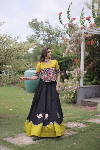 Graceful Black Yellow Roman Fabric Navratri Lehenga Choli with Kutchi Gamthi Work Navratri Lehnega Choli