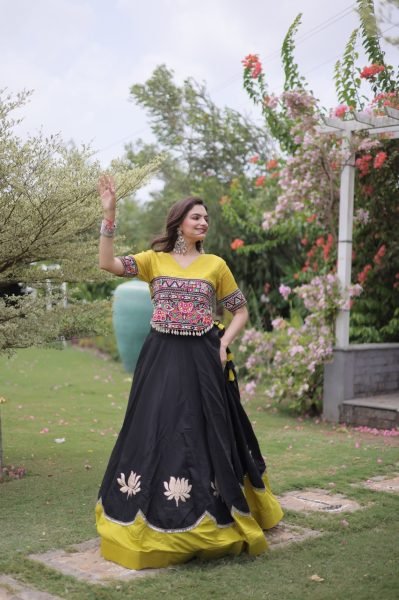 Graceful Black Yellow Roman Fabric Navratri Lehenga Choli with Kutchi Gamthi Work Navratri Lehnega Choli
