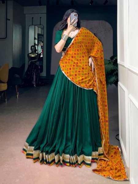 Graceful Dark Green Chinon Navratri Lehenga Choli with Bandhani Dupatta Navratri Lehnega Choli