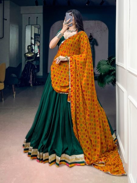 Graceful Dark Green Chinon Navratri Lehenga Choli with Bandhani Dupatta Navratri Lehnega Choli