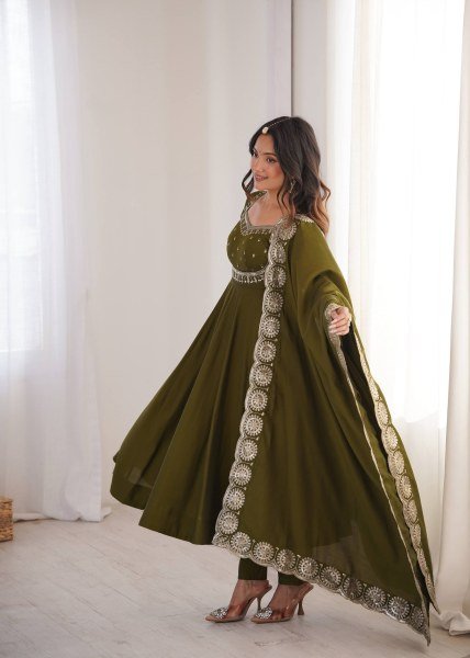 Graceful Mahendi Green Heavy Micro Cotton Inner Roman Silk Gown with Full Sleeves Ready To Wear Collection