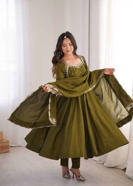 Graceful Mahendi Green Heavy Micro Cotton Inner Roman Silk Gown with Full Sleeves Ready To Wear Collection