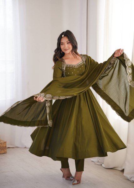Graceful Mahendi Green Heavy Micro Cotton Inner Roman Silk Gown with Full Sleeves Ready To Wear Collection