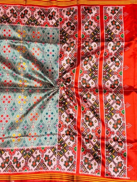 Handcrafted Green Patola Silk Saree with Double Ikkat Print and Heavy Decorative Tassels Patola Silk Sarees Wholesale