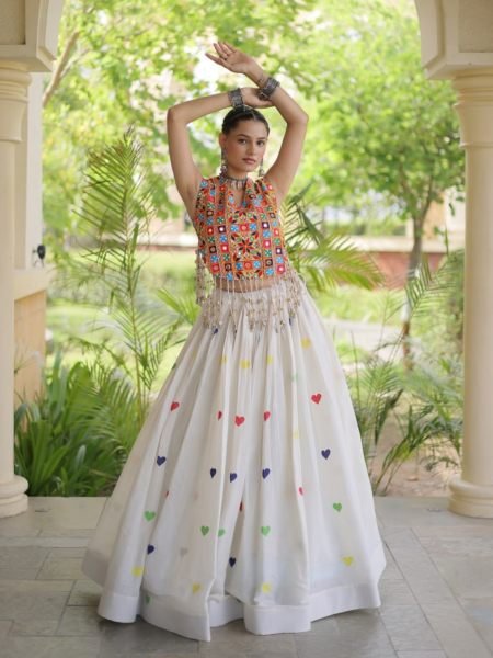 Iconic White Cotton Chaniya Choli with Sleeveless Gamthi Mirror Work Blouse  Lehenga
