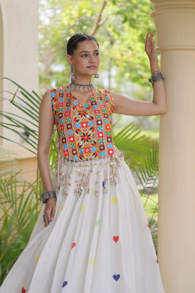 Iconic White Cotton Chaniya Choli with Sleeveless Gamthi Mirror Work Blouse Navratri Lehnega Choli