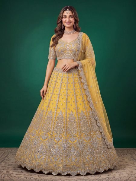 Iconic Yellow Soft Net Bridal Lehenga with Elbow Sleeve Embroidered Blouse