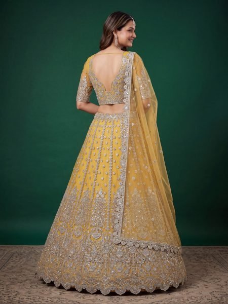 Iconic Yellow Soft Net Bridal Lehenga with Elbow Sleeve Embroidered Blouse Bridal Lehenga Choli