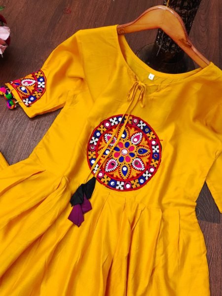 Ingenious Yellow Navratri Dholida Rayon Skirt Top Set with Gamthi Work and Real Mirror At Wholesale Rate Navratri Lehnega Choli