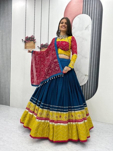 Intricate Blue Navratri Lehenga Choli with Ribbon Lace Detailing and Fox Georgette Dupatta  Lehenga