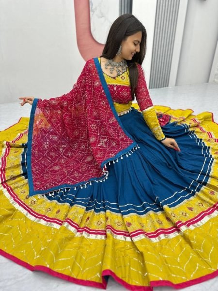 Intricate Blue Navratri Lehenga Choli with Ribbon Lace Detailing and Fox Georgette Dupatta Navratri Lehnega Choli