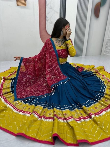 Intricate Blue Navratri Lehenga Choli with Ribbon Lace Detailing and Fox Georgette Dupatta Navratri Lehnega Choli