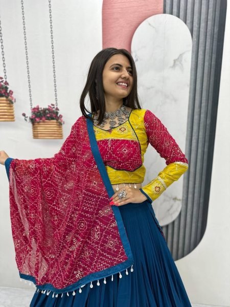 Intricate Blue Navratri Lehenga Choli with Ribbon Lace Detailing and Fox Georgette Dupatta Navratri Lehnega Choli