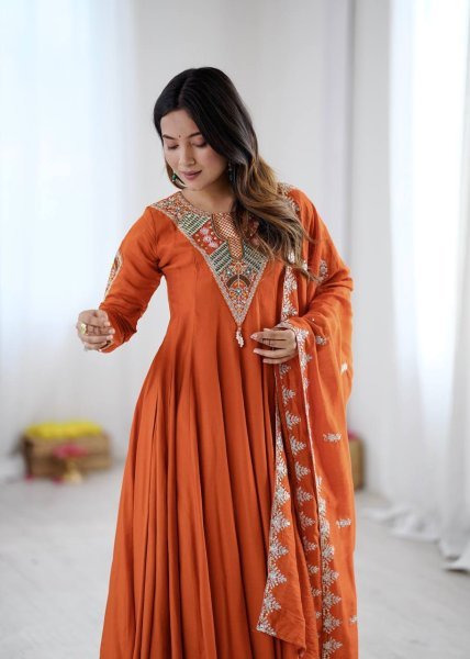 Intricate Orange Roman Silk Designer Gown Set with Full Sleeve Embroidery at Wholeslae Rate Ready To Wear Collection
