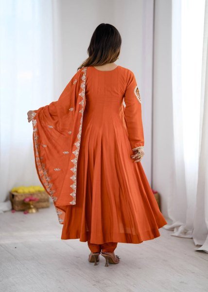 Intricate Orange Roman Silk Designer Gown Set with Full Sleeve Embroidery at Wholeslae Rate Ready To Wear Collection