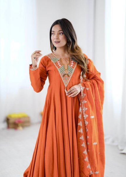 Intricate Orange Roman Silk Designer Gown Set with Full Sleeve Embroidery at Wholeslae Rate Ready To Wear Collection