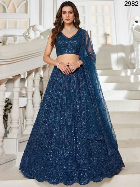 Magnetic Blue Designer Net Lehenga with Heavy Embroidery for Wedding Wear  Lehenga