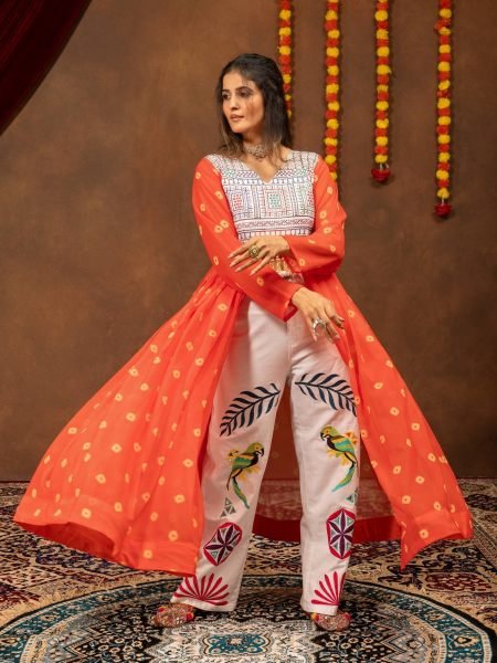 Magnetic Orange Designer Navratri Shrug with Embroidered High Waist Denim Jeans  Kurtis