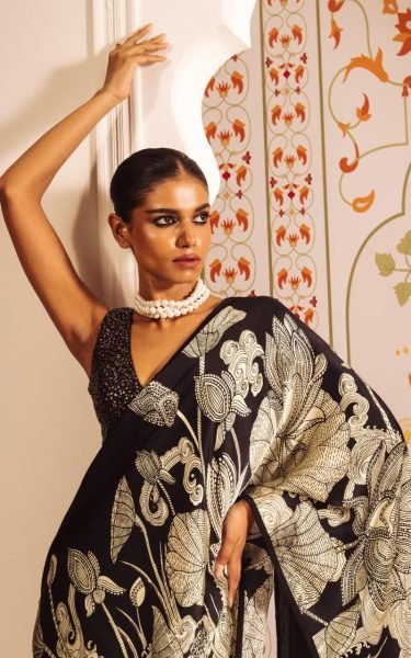 Majestic Black Satin Saree a Gold Floral Print And a Solid Border Printed Cotton Sarees Wholesale