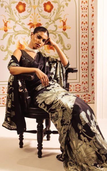 Majestic Black Satin Saree a Gold Floral Print And a Solid Border Printed Cotton Sarees Wholesale