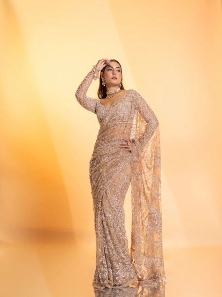 Mesmerizing Champagne Colored Wedding Saree Made From Heavy Quality Butterfly Net Sarees 