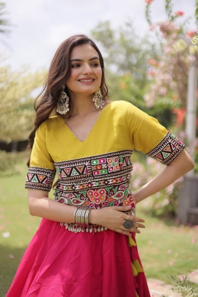 Mesmerizing Pink Yellow Roman Fabric Navratri Lehenga Set with Lotus Gota Work Navratri Lehnega Choli