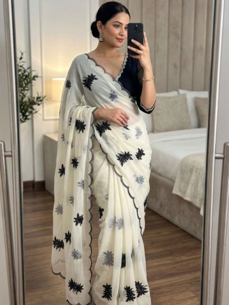 Mesmerizing White Rangoli Silk Saree with Black Floral Embroidery Border  Sarees 