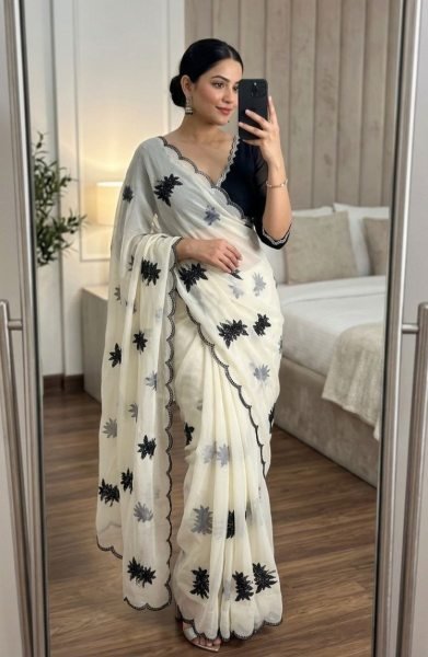 Mesmerizing White Rangoli Silk Saree with Black Floral Embroidery Border  Silk Sarees Wholesale