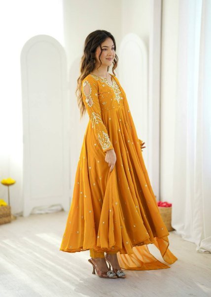 Mesmerizing Yellow Faux Georgette Gown Pant Dupatta Set with 7 Meter Flair for Reseller Ready To Wear Collection