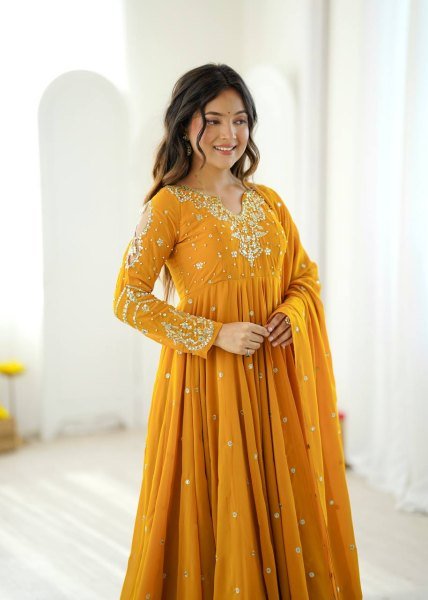 Mesmerizing Yellow Faux Georgette Gown Pant Dupatta Set with 7 Meter Flair for Reseller Ready To Wear Collection