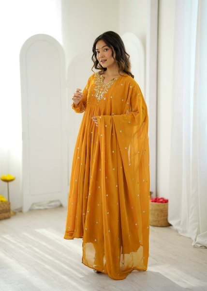 Mesmerizing Yellow Faux Georgette Gown Pant Dupatta Set with 7 Meter Flair for Reseller Ready To Wear Collection