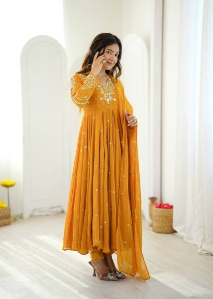 Mesmerizing Yellow Faux Georgette Gown Pant Dupatta Set with 7 Meter Flair for Reseller Ready To Wear Collection